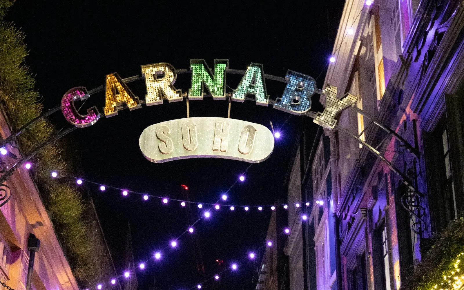 Colourful Christmas lights above the pedestrianised Carnaby Street